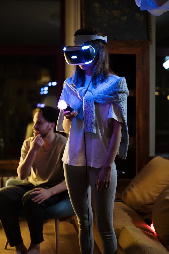 A couple at home experiencing virtual reality gaming, showcasing an immersive VR setup.